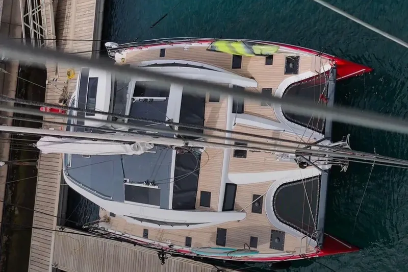 Slide: The Image of Aerial view of 2022 Privilege 510 catamaran docked at a marina. - 4