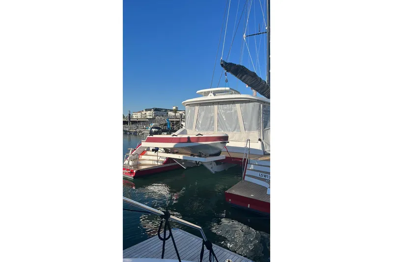 Slide: The Image of Luxury Privilege 510 yacht docked at marina, 2022 model, under clear blue sky. - 5