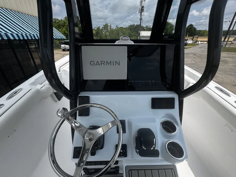 Slide: The Image of 2026 Tidewater 232 LXF helm with Garmin navigation system. - 6