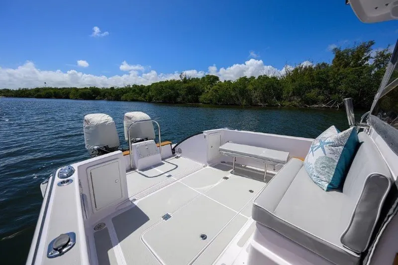 Slide: The Image of Spacious deck of 2022 True North 34 boat with scenic water view. - 13