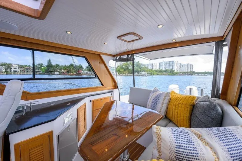 Slide: The Image of Interior of 2022 True North 34 yacht with scenic waterfront view. - 51
