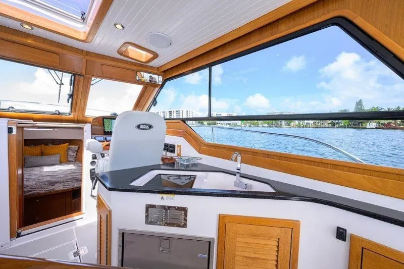 Slide: The Image of Luxurious interior of 2022 True North 34 yacht with scenic water view. - 54