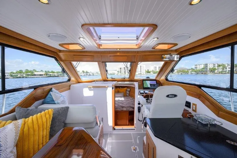 Slide: The Image of Luxurious interior of 2022 True North 34 yacht with panoramic windows and modern amenities. - 57