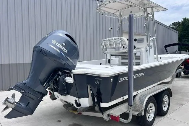 Slide: The Image of 2021 Sportsman Tournament 234 SBX Bay Boat with Yamaha engine on trailer. - 16