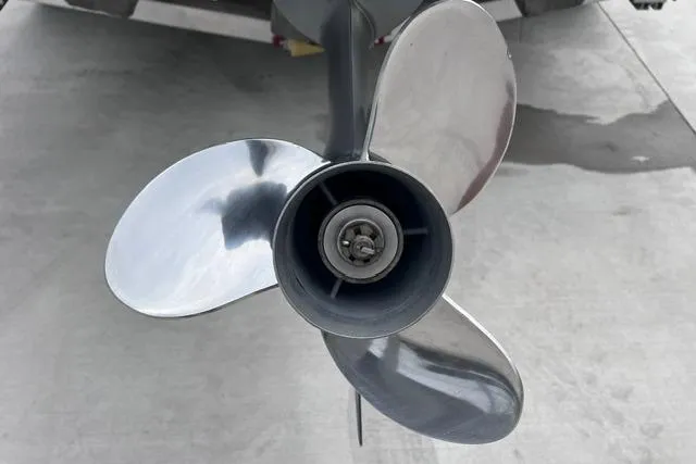 Slide: The Image of Propeller of 2021 Sportsman Tournament 234 SBX Bay Boat on concrete surface. - 18