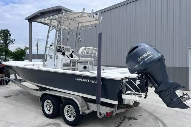 Slide: The Image of 2021 Sportsman Tournament 234 SBX Bay Boat with Yamaha engine on trailer. - 22