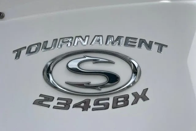 Slide: The Image of 2021 Sportsman Tournament 234 SBX Bay Boat logo on white surface. - 3