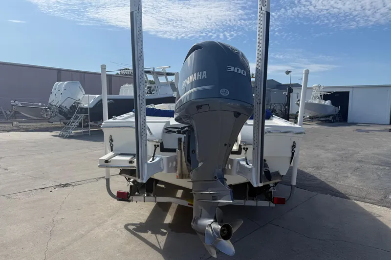 Slide: The Image of 2021 Pathfinder 2500 Hybrid boat with Yamaha 300 engine in a marina. - 3