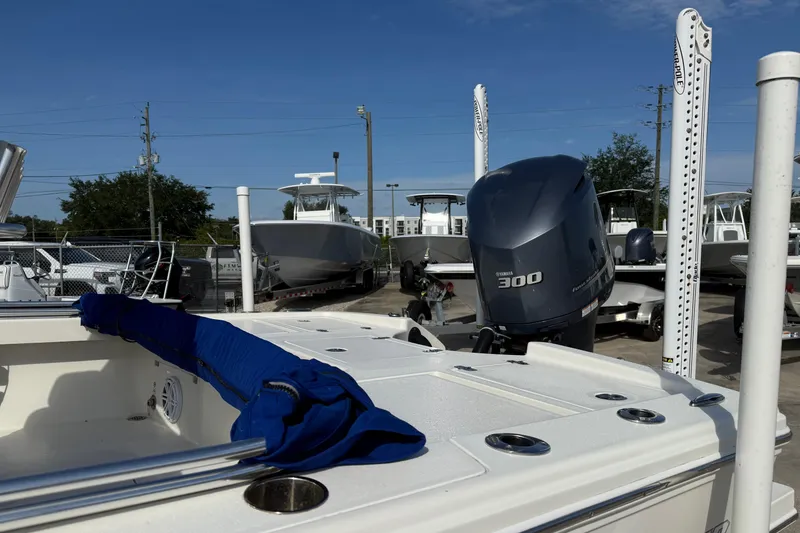 Slide: The Image of 2021 Pathfinder 2500 Hybrid boat with Yamaha 300 engine in a marina. - 6