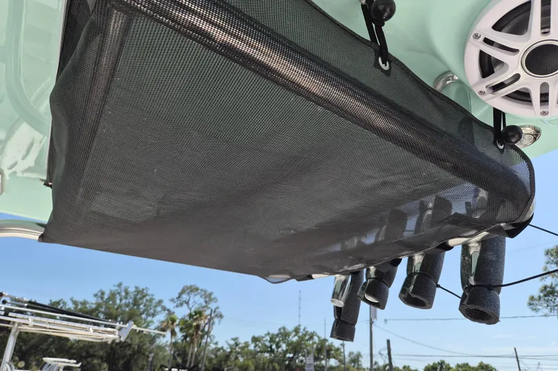 Slide: The Image of Key West 239 FS boat with rod holders and speaker, 2026 model. - 8