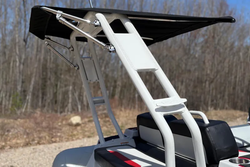 Slide: The Image of 2025 Highfield Velox 420 boat with canopy, sleek design, and modern seating. - 8