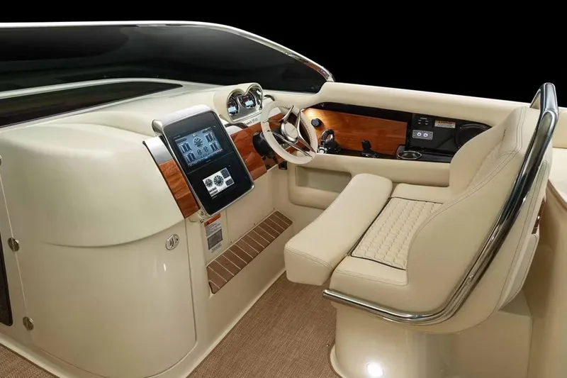 Slide: The Image of Manufacturer Provided Image: 2026 Chris-Craft Launch 35 GT cockpit with modern dashboard and luxurious seating. - 3