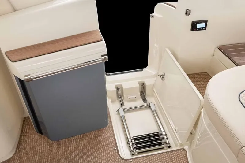 Slide: The Image of Manufacturer Provided Image: 2026 Chris-Craft Launch 35 GT interior with storage compartment and ladder. - 4