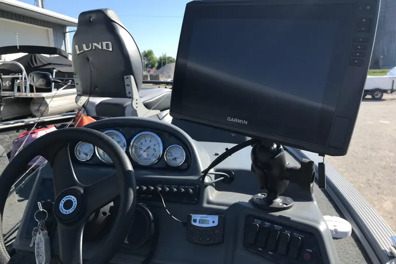Slide: The Image of Interior of a 2011 Lund 1775 Impact boat with Garmin navigation system. - 11