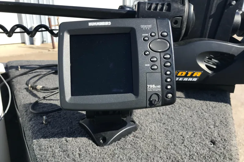 Slide: The Image of Humminbird fish finder on 2011 Lund 1775 Impact boat, featuring GPS and side imaging. - 13