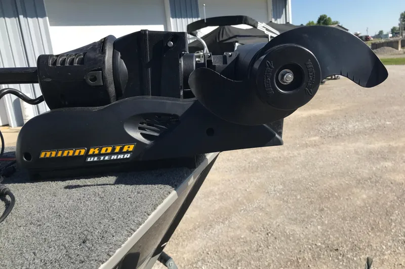Slide: The Image of Minn Kota Ulterra motor on 2011 Lund 1775 Impact boat, outdoor setting. - 14