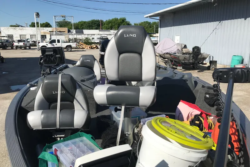 Slide: The Image of 2011 Lund 1775 Impact boat with fishing gear and equipment on deck. - 19