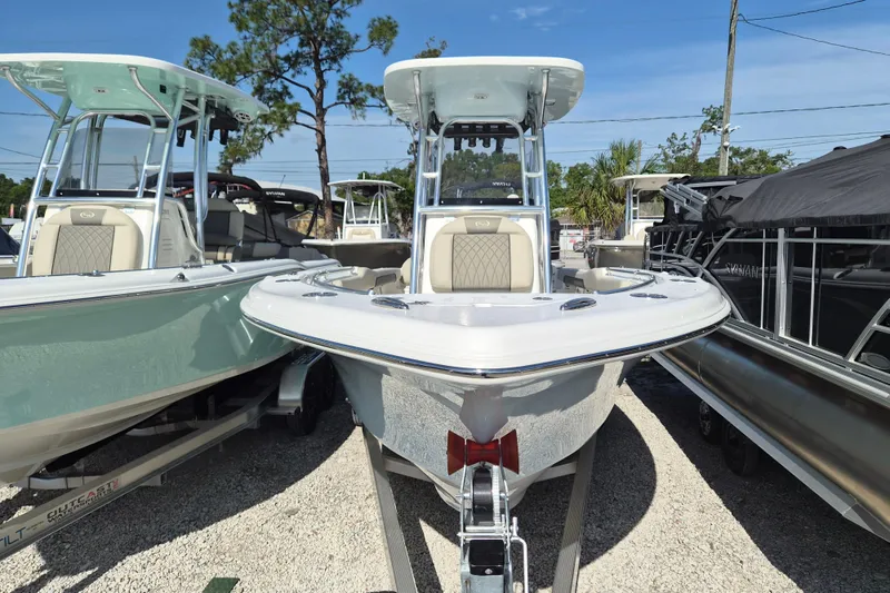 The Image of 2026 Key West 239 FS boat displayed outdoors, surrounded by other boats. - 1