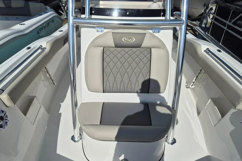 Slide: The Image of 2026 Key West 239 FS boat seat with quilted upholstery and stainless steel frame. - 16