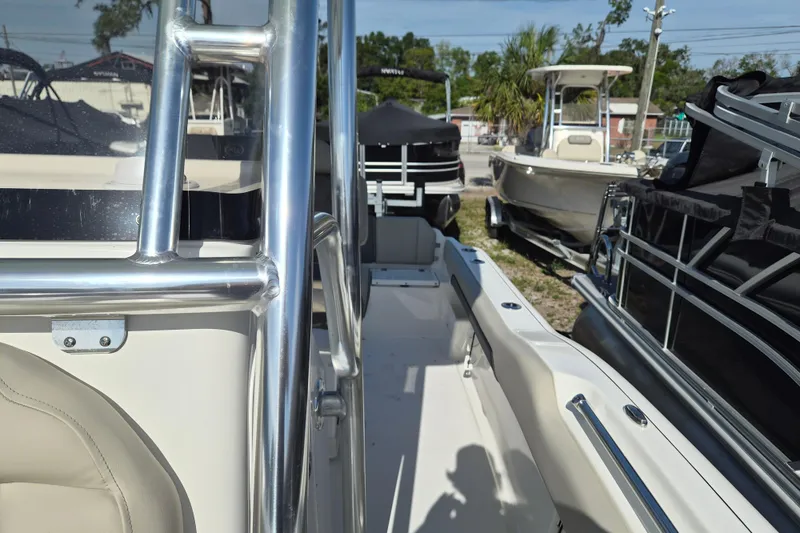 Slide: The Image of 2026 Key West 239 FS boat interior with stainless steel railing and seating. - 18
