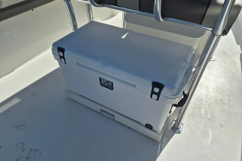 Slide: The Image of White cooler on 2026 Key West 239 FS boat deck, secured with metal frame. - 5