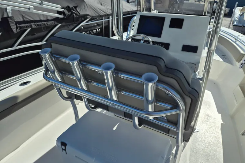 Slide: The Image of 2026 Key West 239 FS boat interior with rod holders and console. - 6