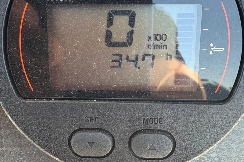 Slide: The Image of Digital display showing 347 hours on a 2021 Sea Fox 206 Commander boat. - 6