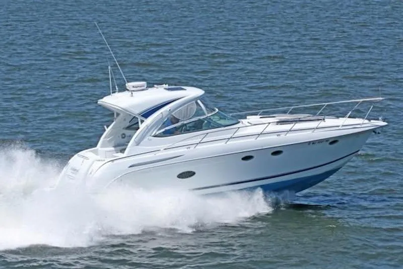 The Image of 2011 Formula 37 Performance Cruiser speeding on open water. - 0