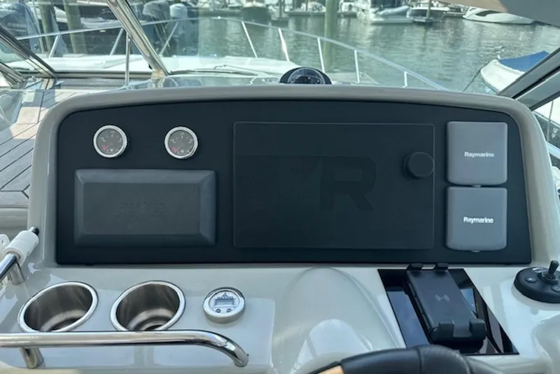 Slide: The Image of Helm of 2011 Formula 37 Performance Cruiser with Raymarine electronics and gauges at marina. - 16