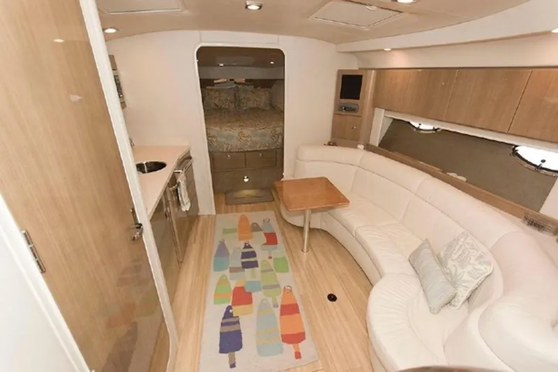 Slide: The Image of Interior of a 2011 Formula 37 Performance Cruiser with modern furnishings and cozy seating. - 22