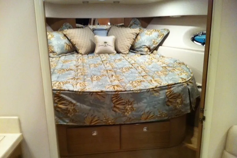 Slide: The Image of Cozy bedroom interior of 2011 Formula 37 Performance Cruiser with floral bedding and pillows. - 24