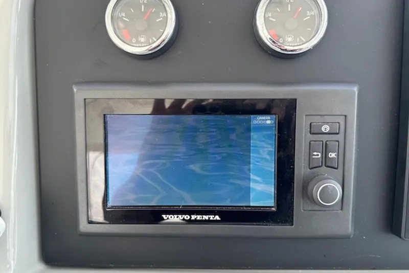 Slide: The Image of Volvo Penta display and gauges on 2011 Formula 37 Performance Cruiser dashboard. - 26