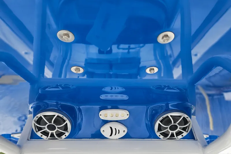 Slide: The Image of 2021 Sea Pro 259 Center Console boat speakers and lights, blue interior view. - 26
