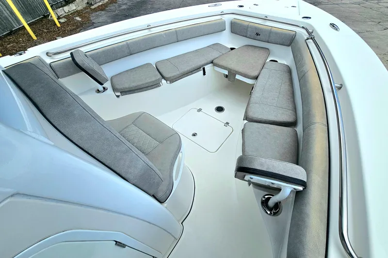 Slide: The Image of 2021 Sea Pro 259 Center Console boat with spacious seating and modern design. - 9
