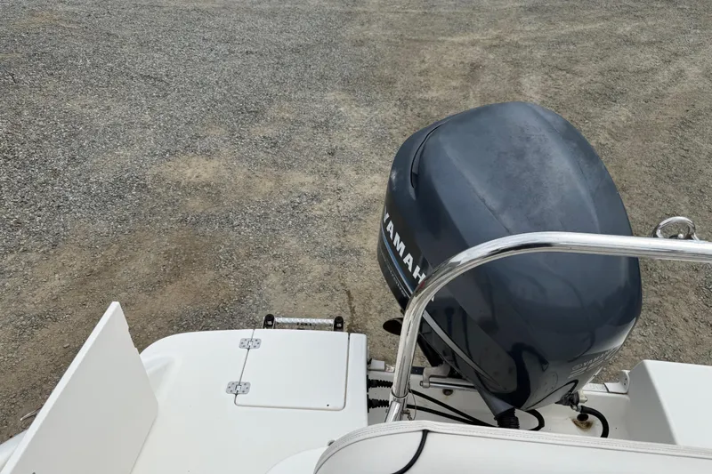 Slide: The Image of 2007 Robalo R227 Dual Console with Yamaha outboard motor on gravel surface. - 15