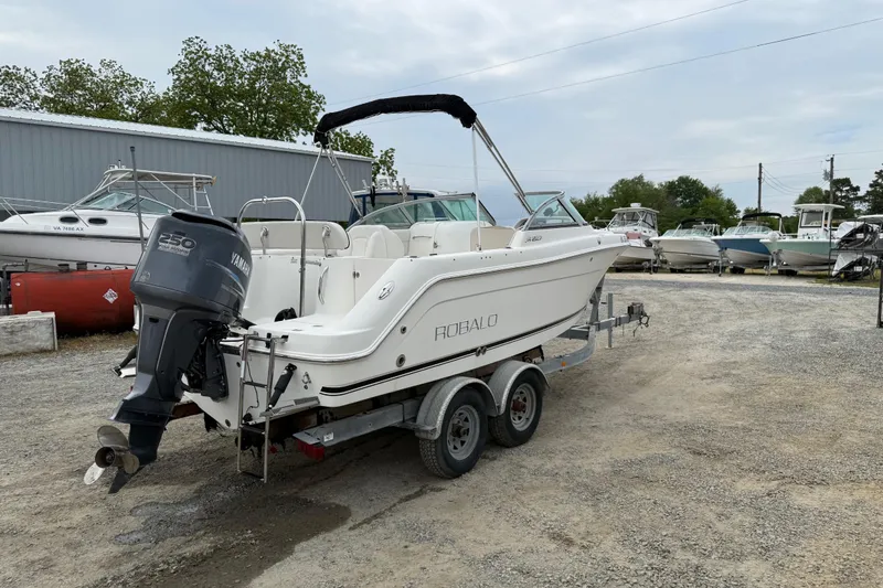 Slide: The Image of 2007 Robalo R227 Dual Console boat on trailer with Yamaha outboard motor. - 17