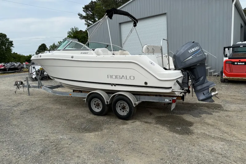 Slide: The Image of 2007 Robalo R227 Dual Console boat on trailer with Yamaha outboard motor. - 18