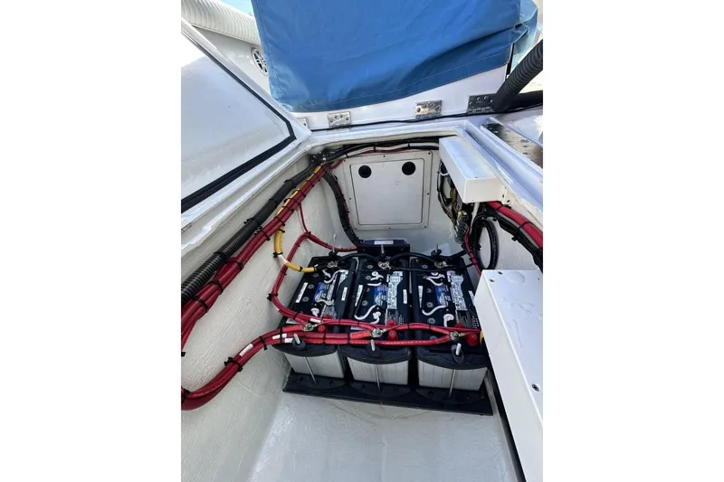 Slide: The Image of Battery compartment of a 2006 Albin 26 Center Console boat, featuring organized wiring. - 17