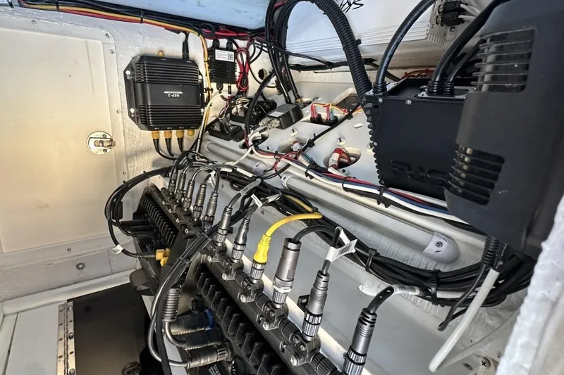 Slide: The Image of Electrical wiring and components inside a 2006 Albin 26 Center Console boat. - 6