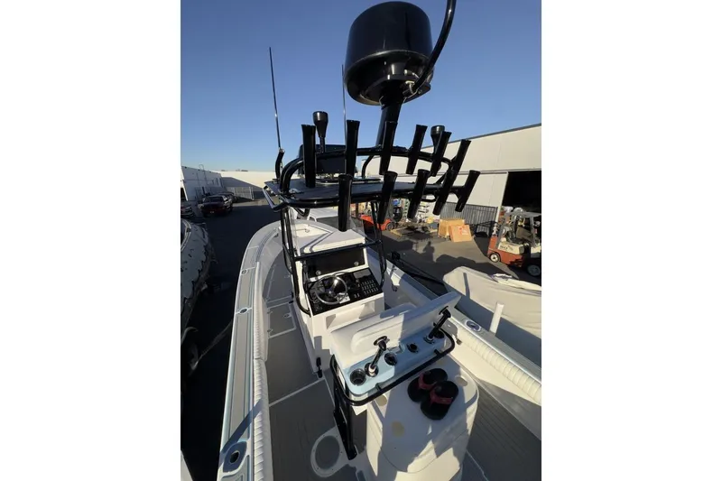Slide: The Image of 2006 Albin 26 Center Console boat with advanced navigation equipment and rod holders. - 8