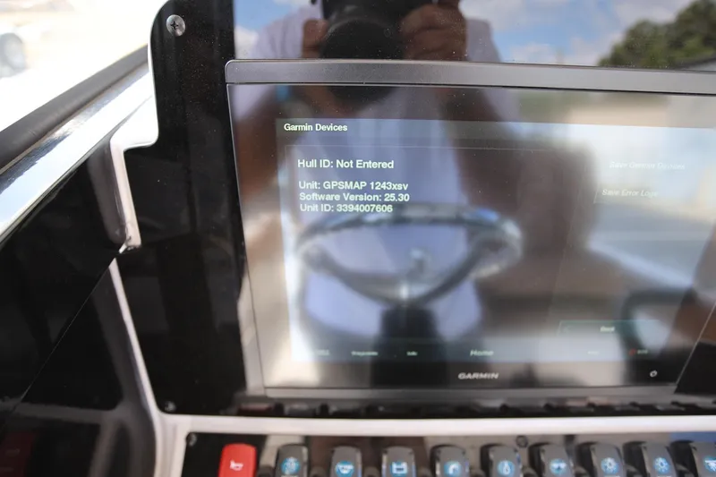 Slide: The Image of Garmin GPS display on 2022 Sea Hunt Ultra 239 SE boat dashboard. - 16