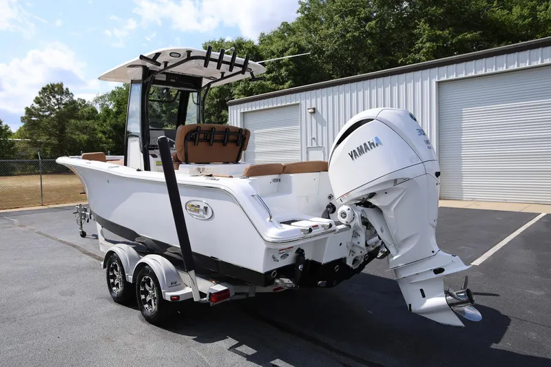 Slide: The Image of 2022 Sea Hunt Ultra 239 SE boat with Yamaha engine on trailer. - 4