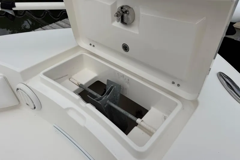 Slide: The Image of Open anchor storage compartment on 2019 Regulator 26XO boat. - 19