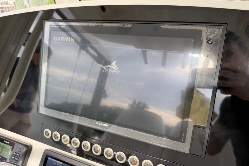 Slide: The Image of Garmin GPS display on 2019 Regulator 26XO boat dashboard. - 29
