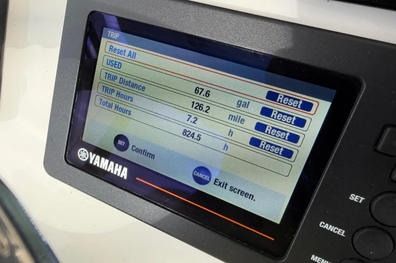 Slide: The Image of Yamaha display on 2019 Regulator 26XO showing trip data and reset options. - 50