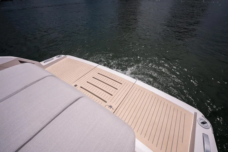Slide: The Image of Rear deck of 2026 Santasevera 42 yacht on calm water. - 14