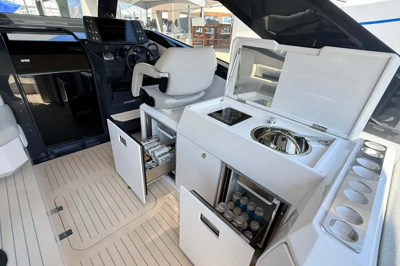 Slide: The Image of Luxurious Santasevera 42 yacht interior with modern kitchenette and helm, 2026 model. - 6