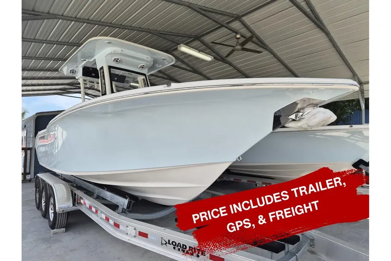 The Image of 2026 Key West 260 Center Console boat on trailer, price includes GPS and freight. - 0