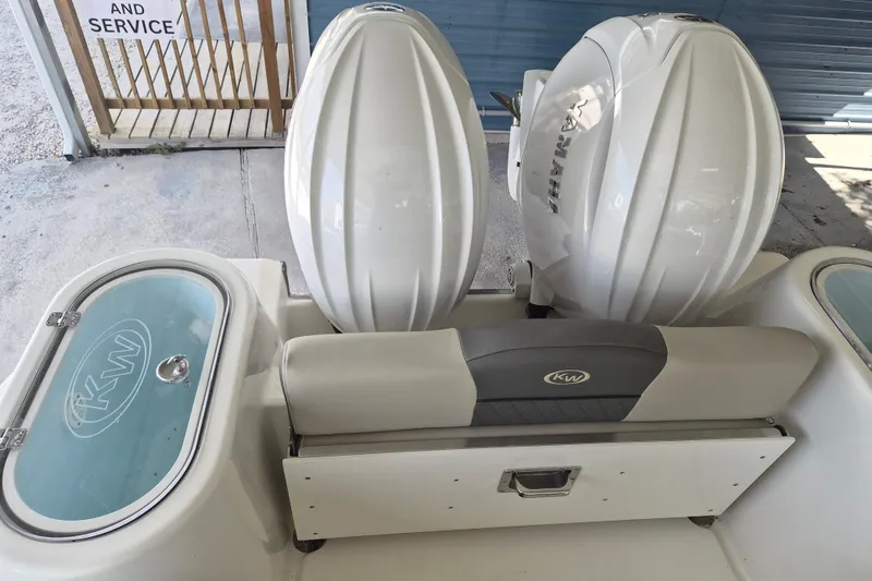 Slide: The Image of 2026 Key West 260 Center Console boat with dual engines and KW logo. - 6