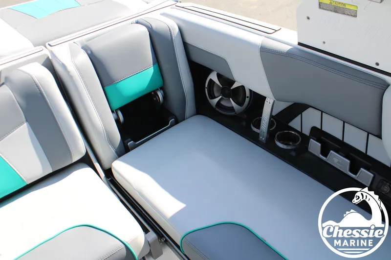 Slide: The Image of Interior of 2020 Malibu Wakesetter 23 MXZ with gray and turquoise seating. - 13